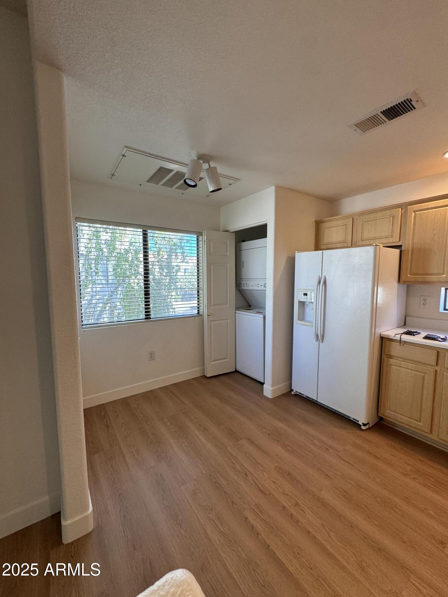 9555 East Raintree Drive, Unit 2008 Scottsdale, AZ 85260 - Photo 10 of 17 a view of an empty room with a window