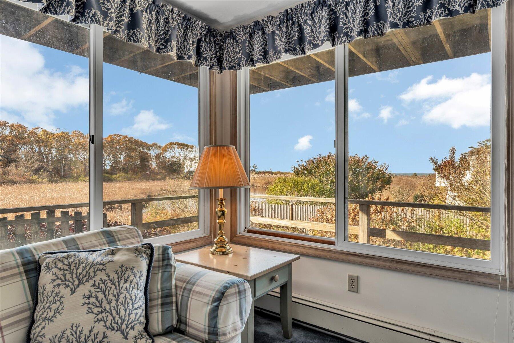 38 Nemasket Road West Falmouth, MA 02540 - Photo 17 of 51 a view of a dining room with furniture window and outside view