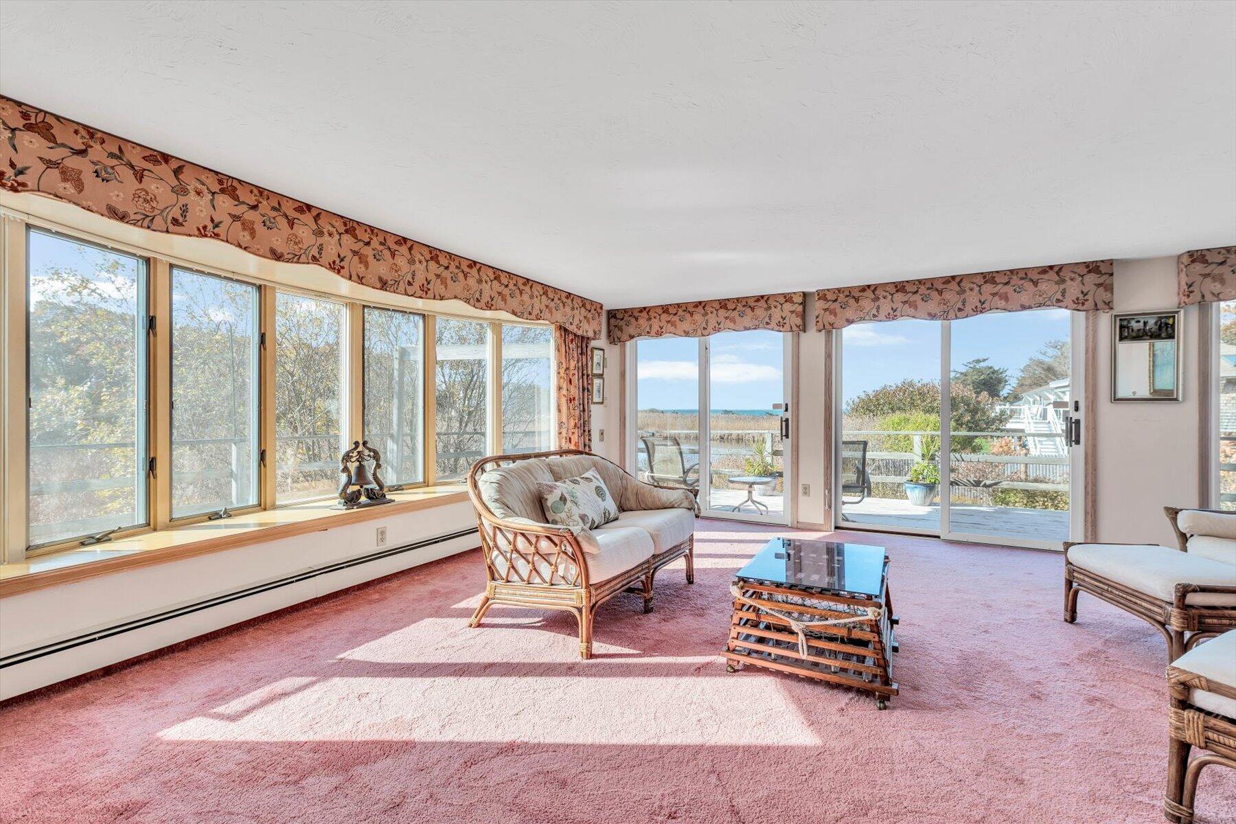 38 Nemasket Road West Falmouth, MA 02540 - Photo 19 of 51 a living room with furniture and a large window