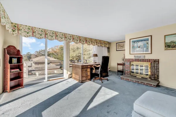 a view of an ocean beach and mountain