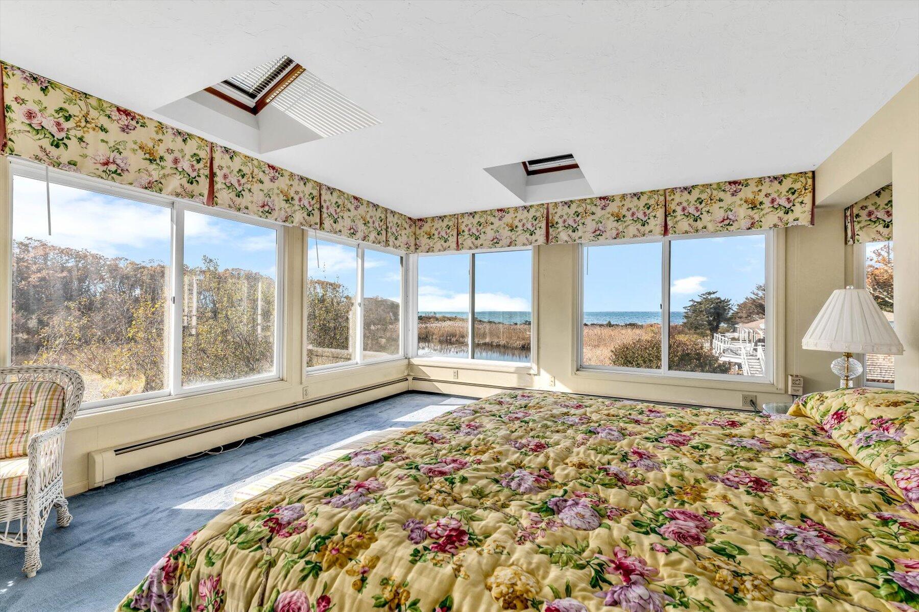 38 Nemasket Road West Falmouth, MA 02540 - Photo 26 of 51 a bed room with a bed and a large window