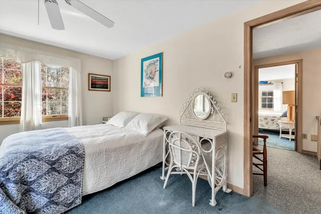 a bedroom with a bed and a closet