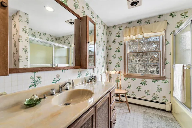 a swimming pool with yard in front of it