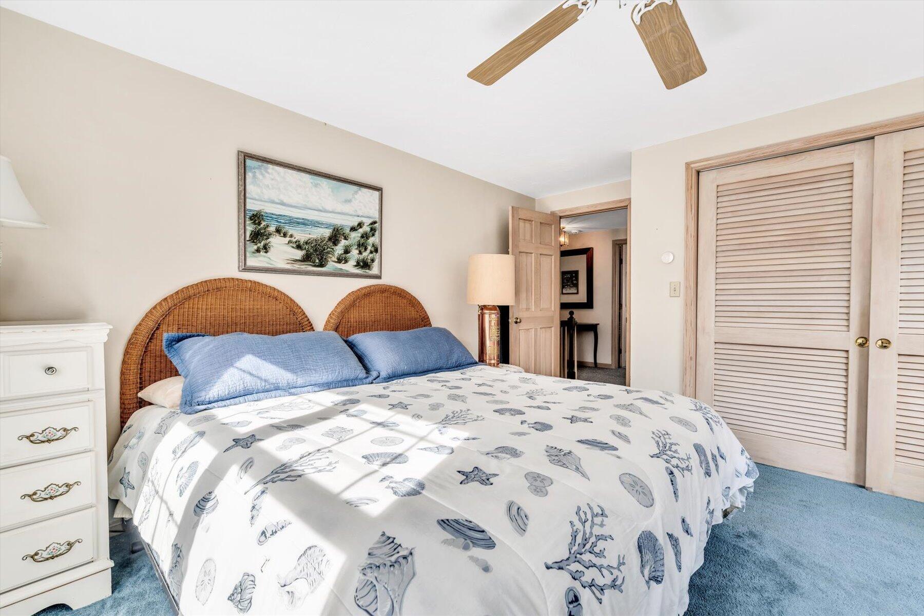 38 Nemasket Road West Falmouth, MA 02540 - Photo 35 of 51 a bedroom with a bed and a closet