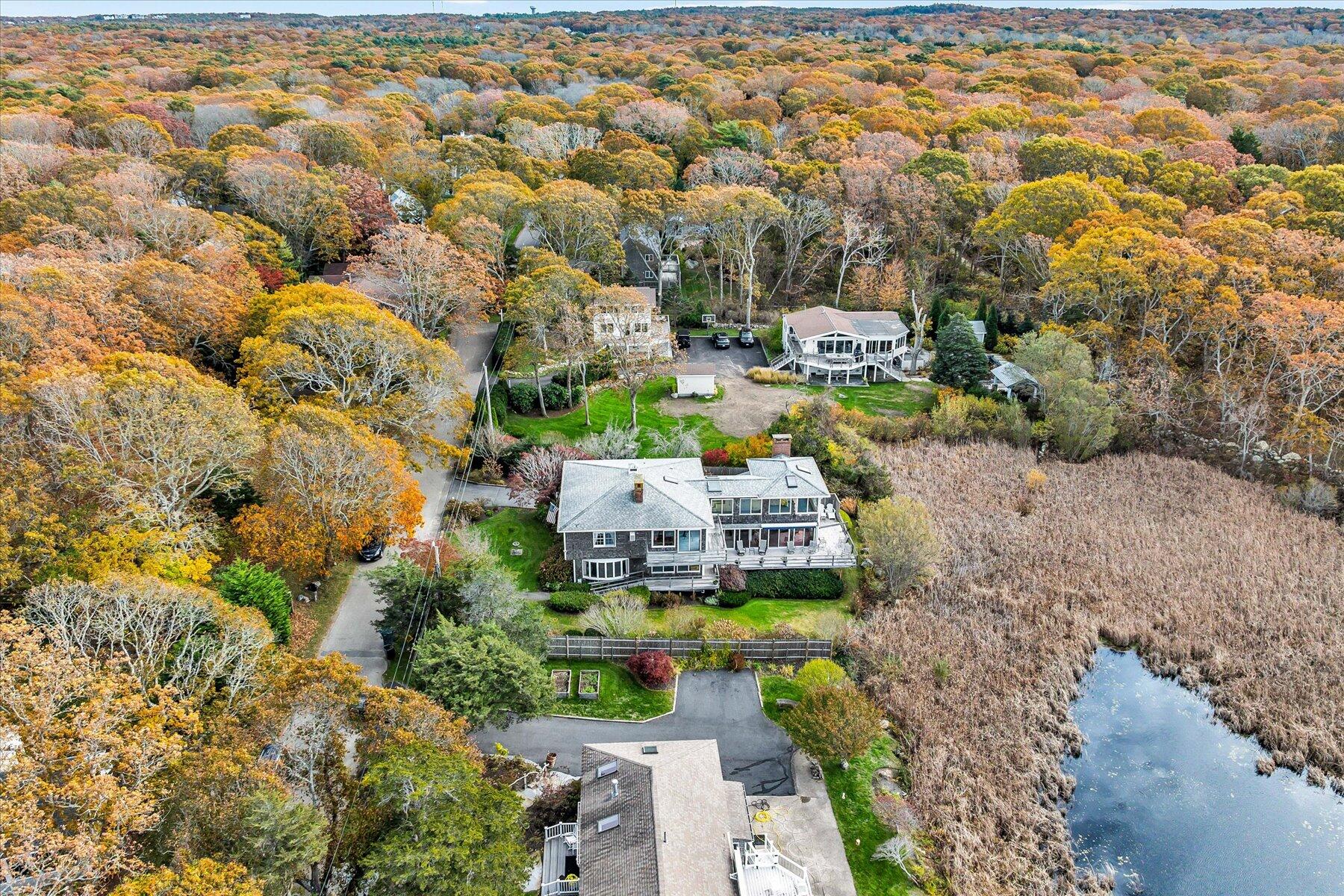 38 Nemasket Road West Falmouth, MA 02540 - Photo 39 of 51 an aerial view of a house with a garden