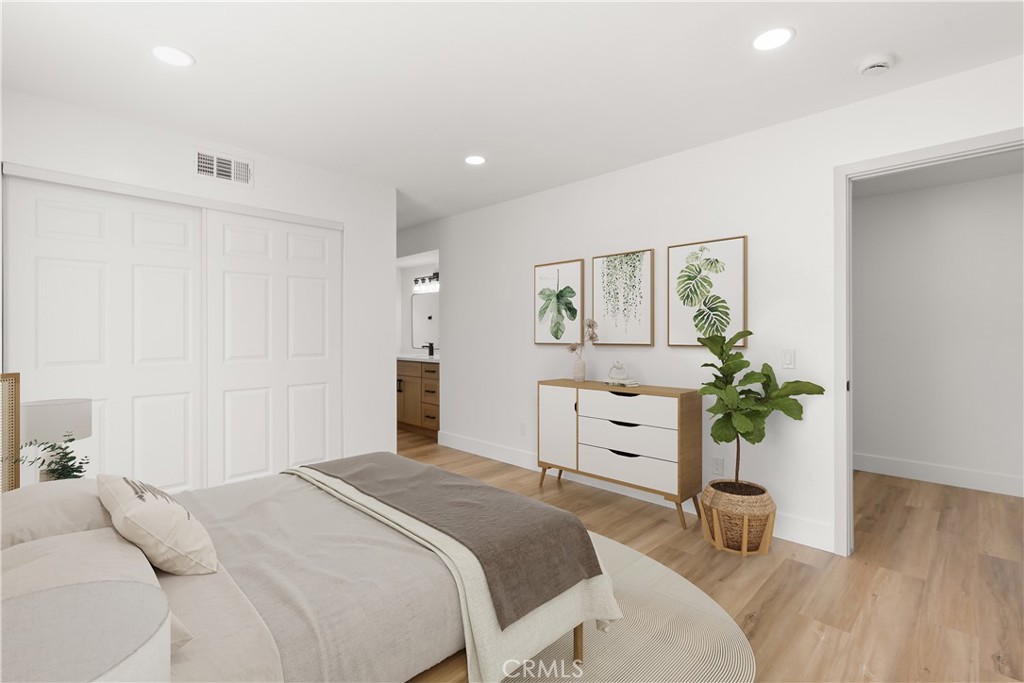 87 Tennessee Street, Unit C Redlands, CA 92373 - Photo 5 of 32 a bedroom with a bed and a dresser