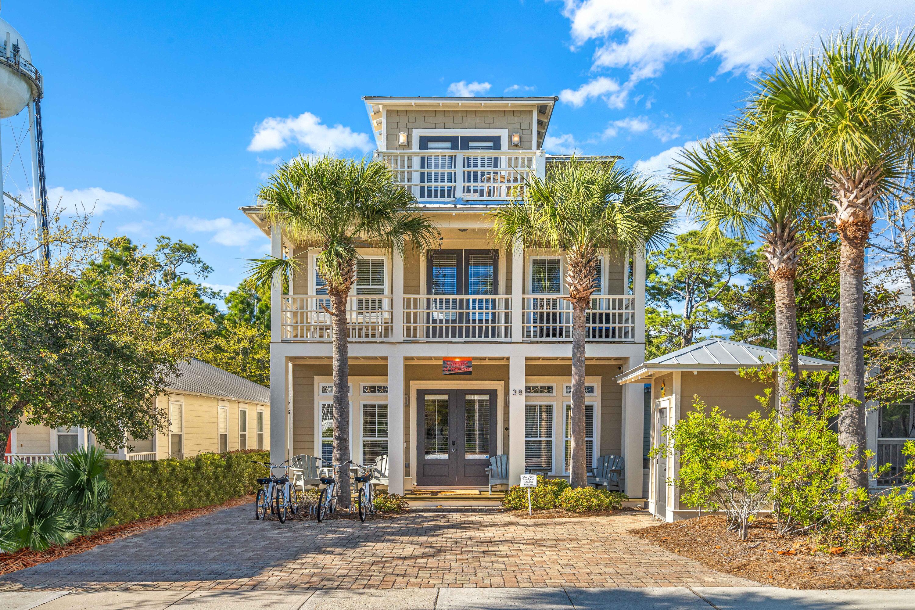 38 Endless Summer Way West Seacrest, FL 32461 - Photo 2 of 67 a front view of a house with garden