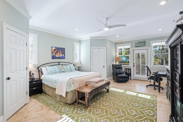 a view of a balcony with a table and chairs
