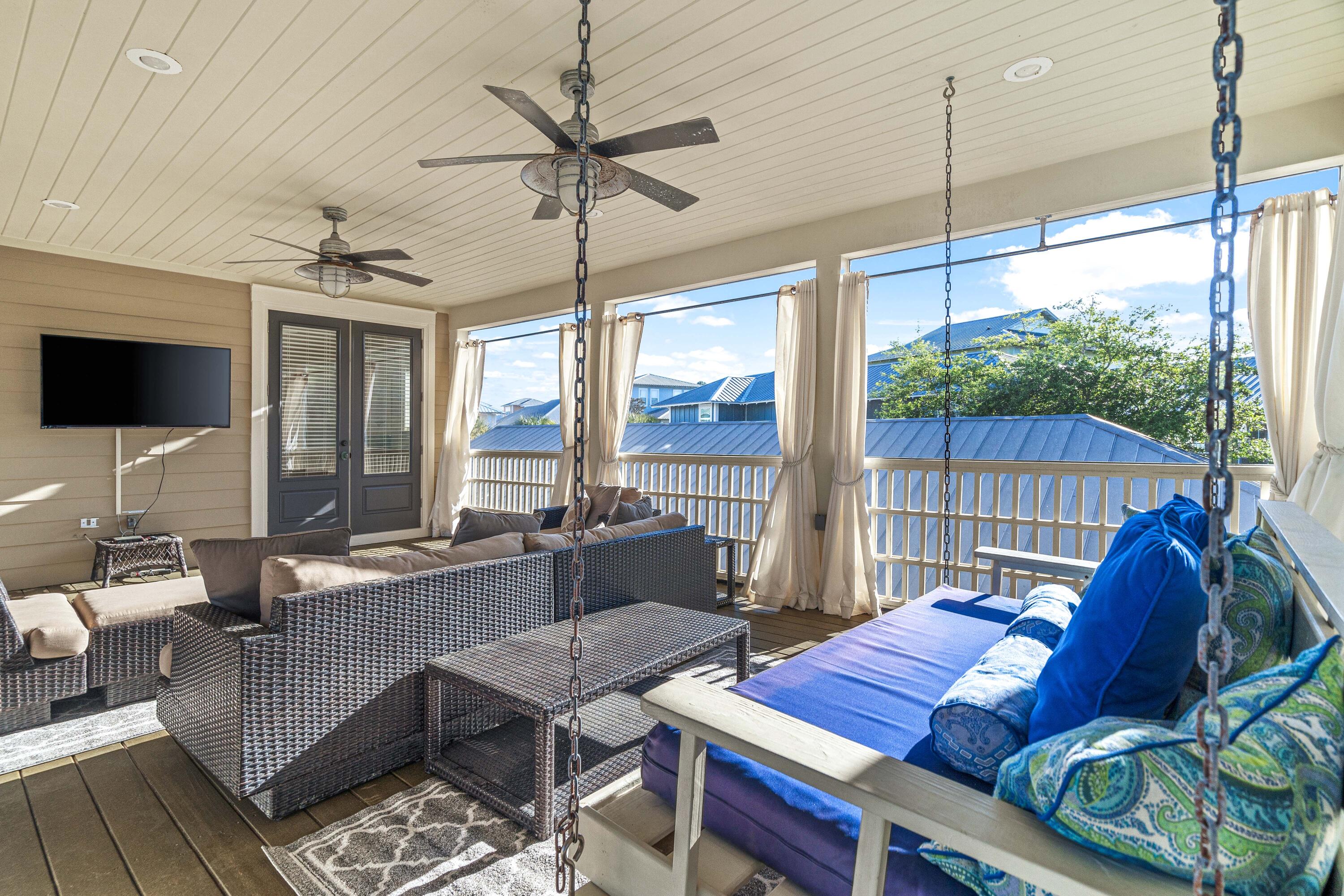 38 Endless Summer Way West Seacrest, FL 32461 - Photo 46 of 67 a living room with furniture and a floor to ceiling window