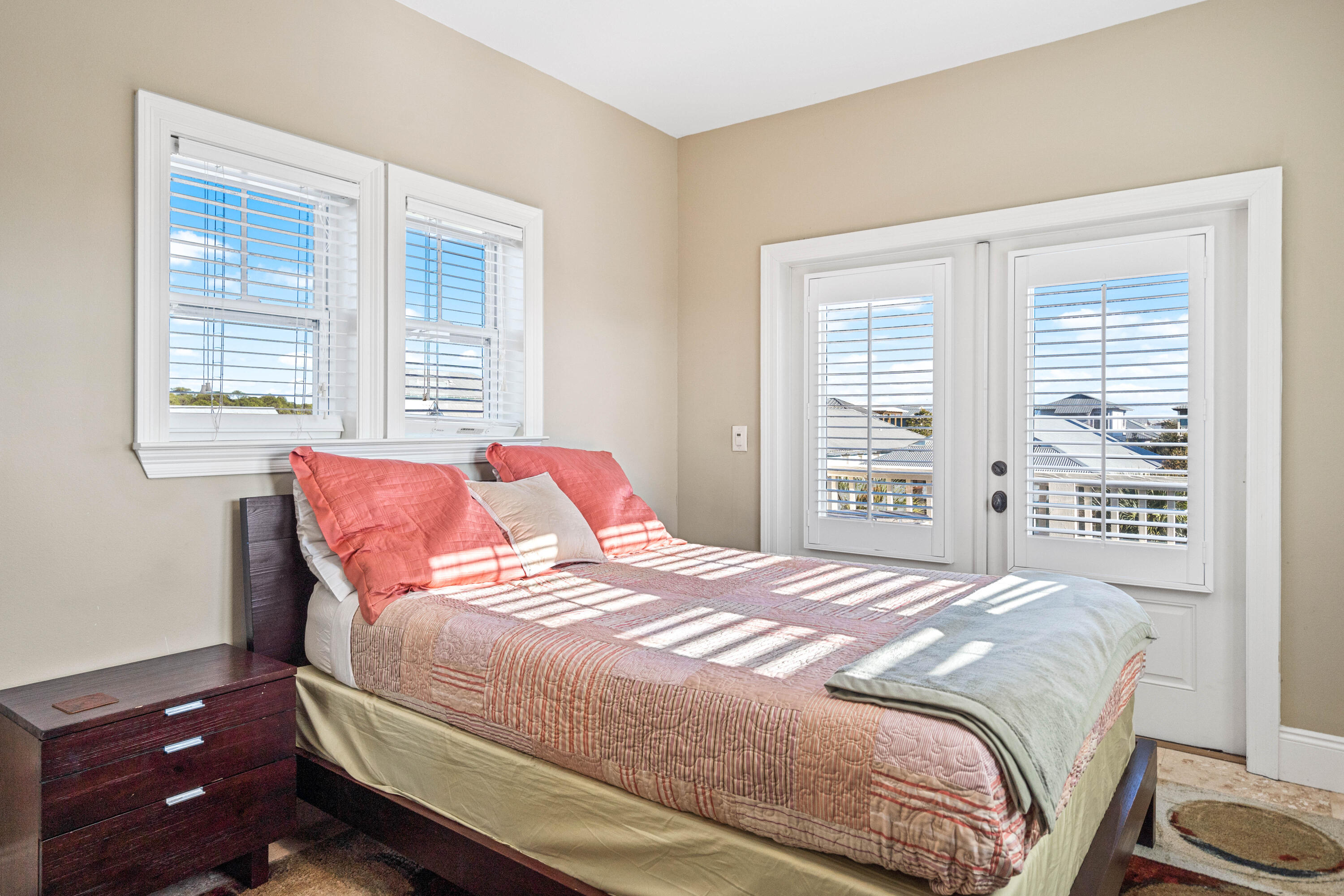 38 Endless Summer Way West Seacrest, FL 32461 - Photo 49 of 67 a bedroom with a bed a dresser and a window