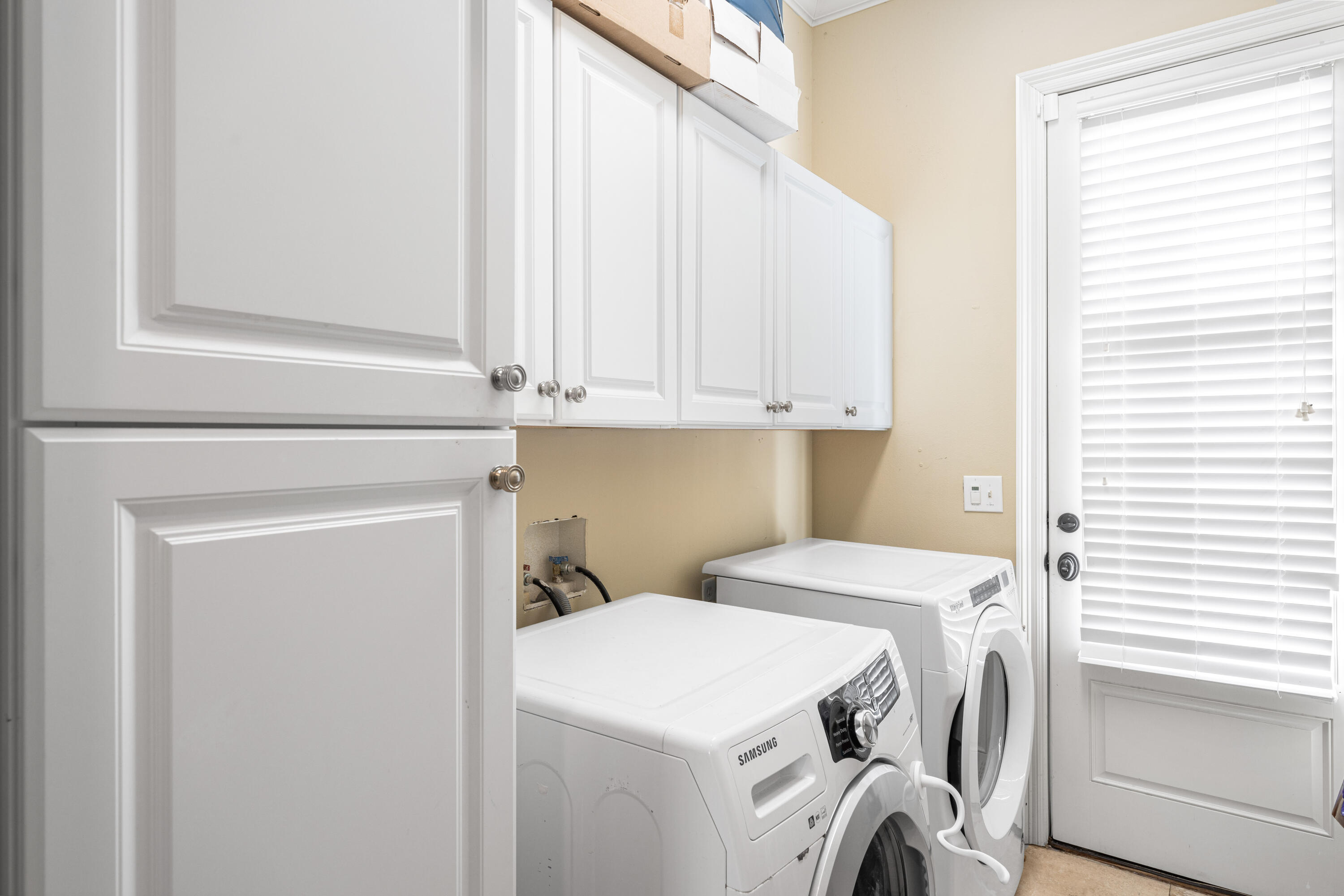 38 Endless Summer Way West Seacrest, FL 32461 - Photo 50 of 67 a view of storage and utility room with washer and dryer