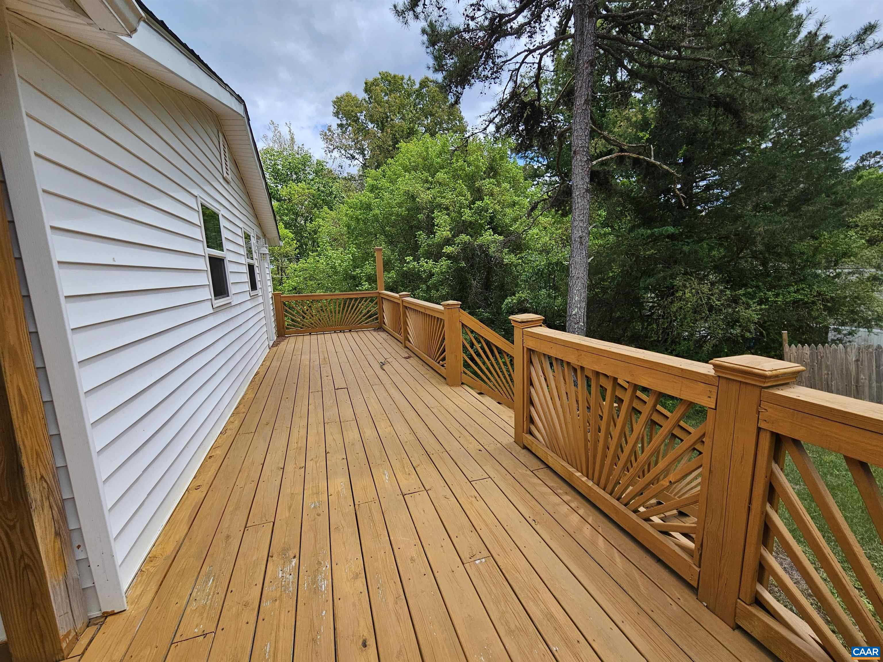 5290 Dixie Hill Road Buckingham, VA 23921 - Photo 8 of 24 a view of balcony with wooden floor and fence