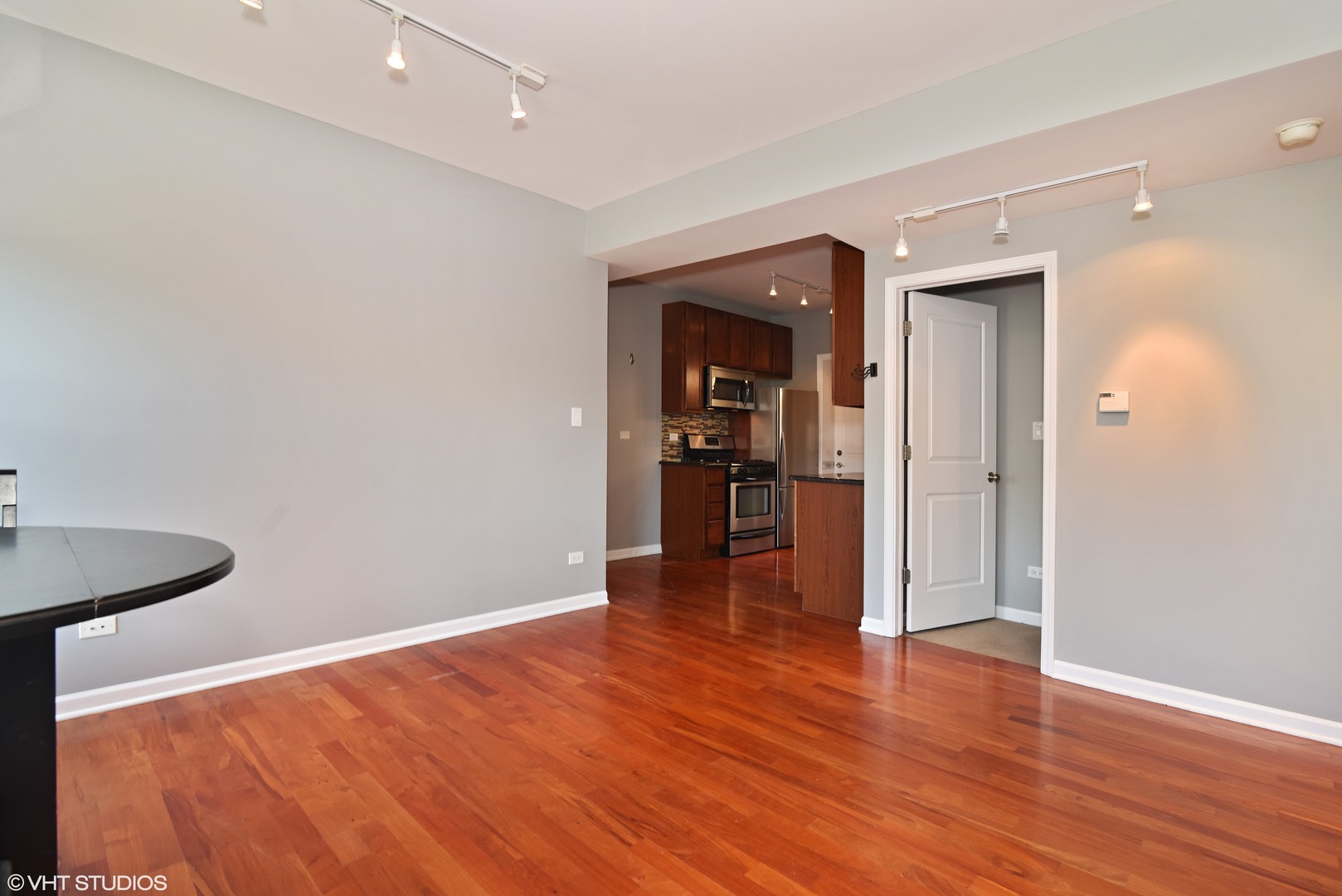 1750 West Rascher Avenue, Unit 2 Chicago, IL 60640 - Photo 3 of 12 a view of empty room with wooden floor