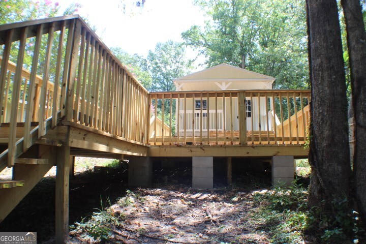 480 River Road Eastman, GA 31023 - Photo 21 of 23 a front view of a house with a yard and porch