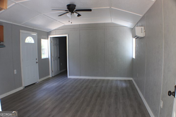 480 River Road Eastman, GA 31023 - Photo 4 of 23 wooden floor in an empty room with a window