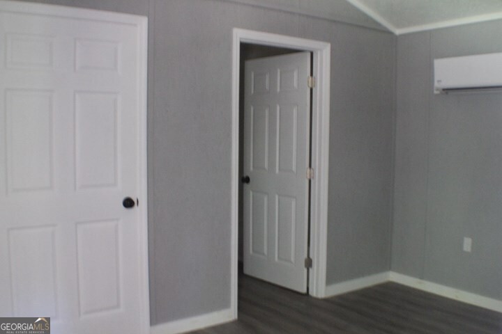480 River Road Eastman, GA 31023 - Photo 8 of 23 a view of a hallway with wooden floor