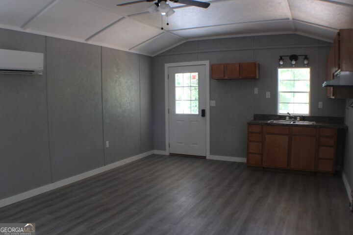480 River Road Eastman, GA 31023 - Photo 9 of 23 a view of a kitchen from the hallway