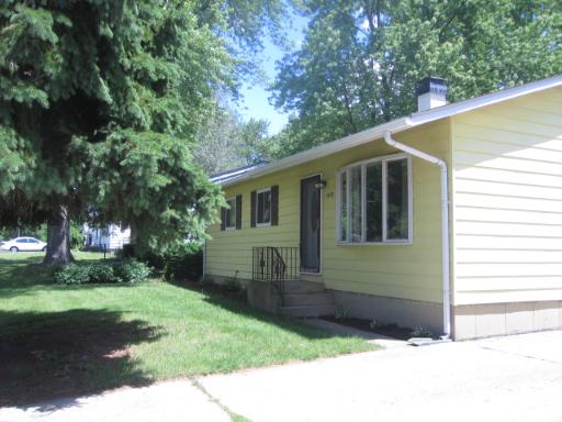 1402 Monroe Street Lake In The Hills, IL 60156 - Photo 1 of 1 a front view of a house with garden