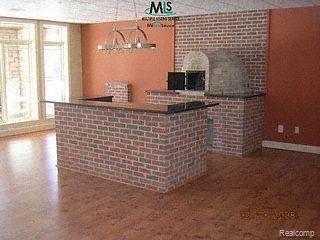 5934 River Ridge Lane Almont, MI 48003 - Photo 4 of 12 walk out kitchen