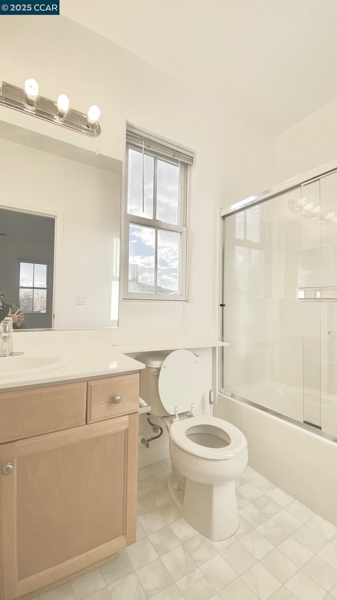 1027 Main Street, Unit B Hercules, CA 94547 - Photo 24 of 39 a bathroom with a sink toilet and shower