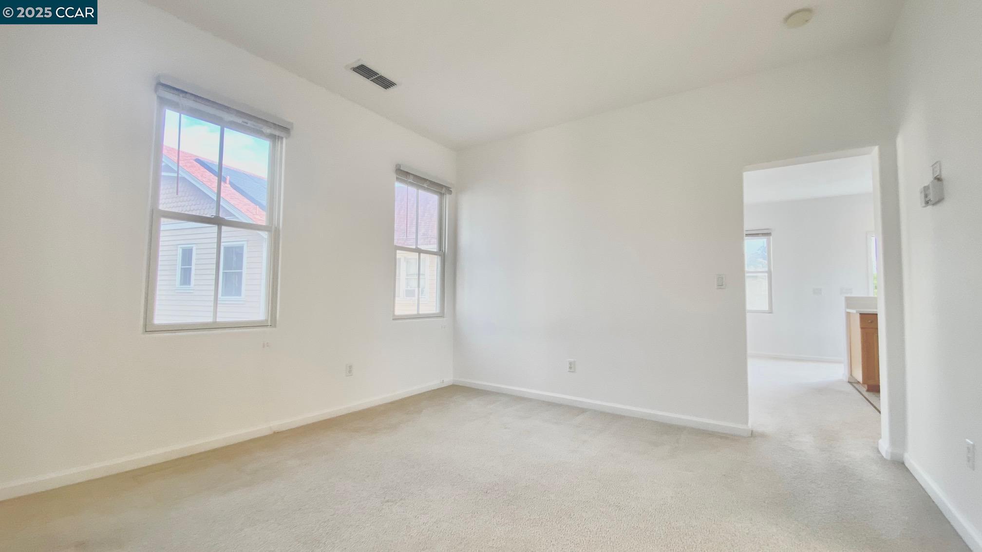 1027 Main Street, Unit B Hercules, CA 94547 - Photo 25 of 39 a view of empty room with windows