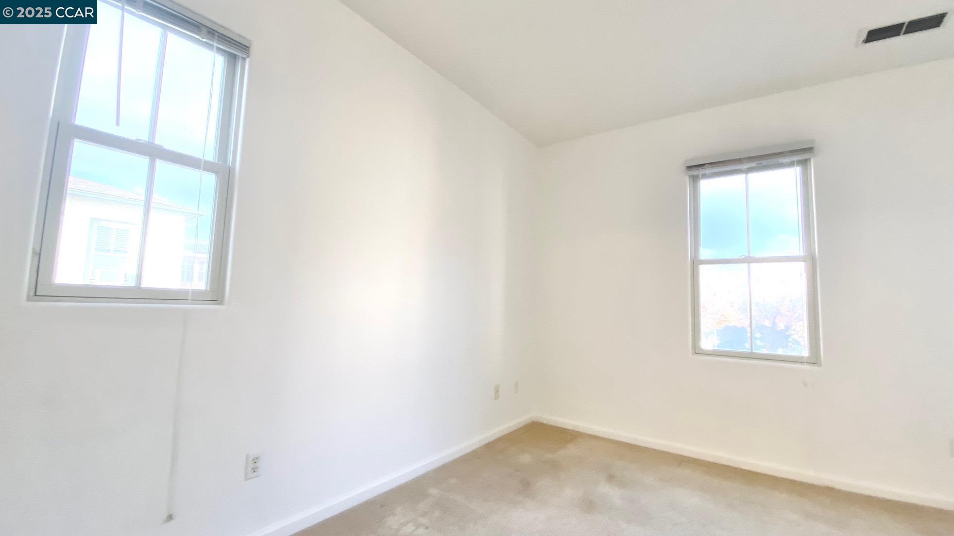 1027 Main Street, Unit B Hercules, CA 94547 - Photo 28 of 39 an empty room with a window