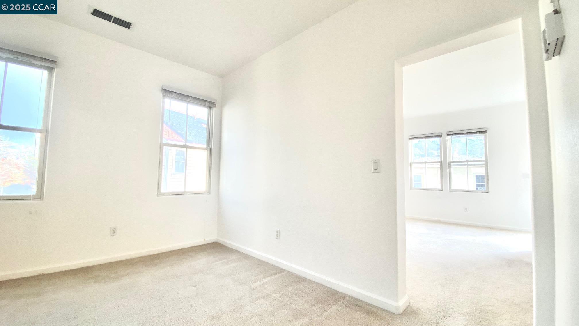 1027 Main Street, Unit B Hercules, CA 94547 - Photo 30 of 39 a view of an empty room with a window
