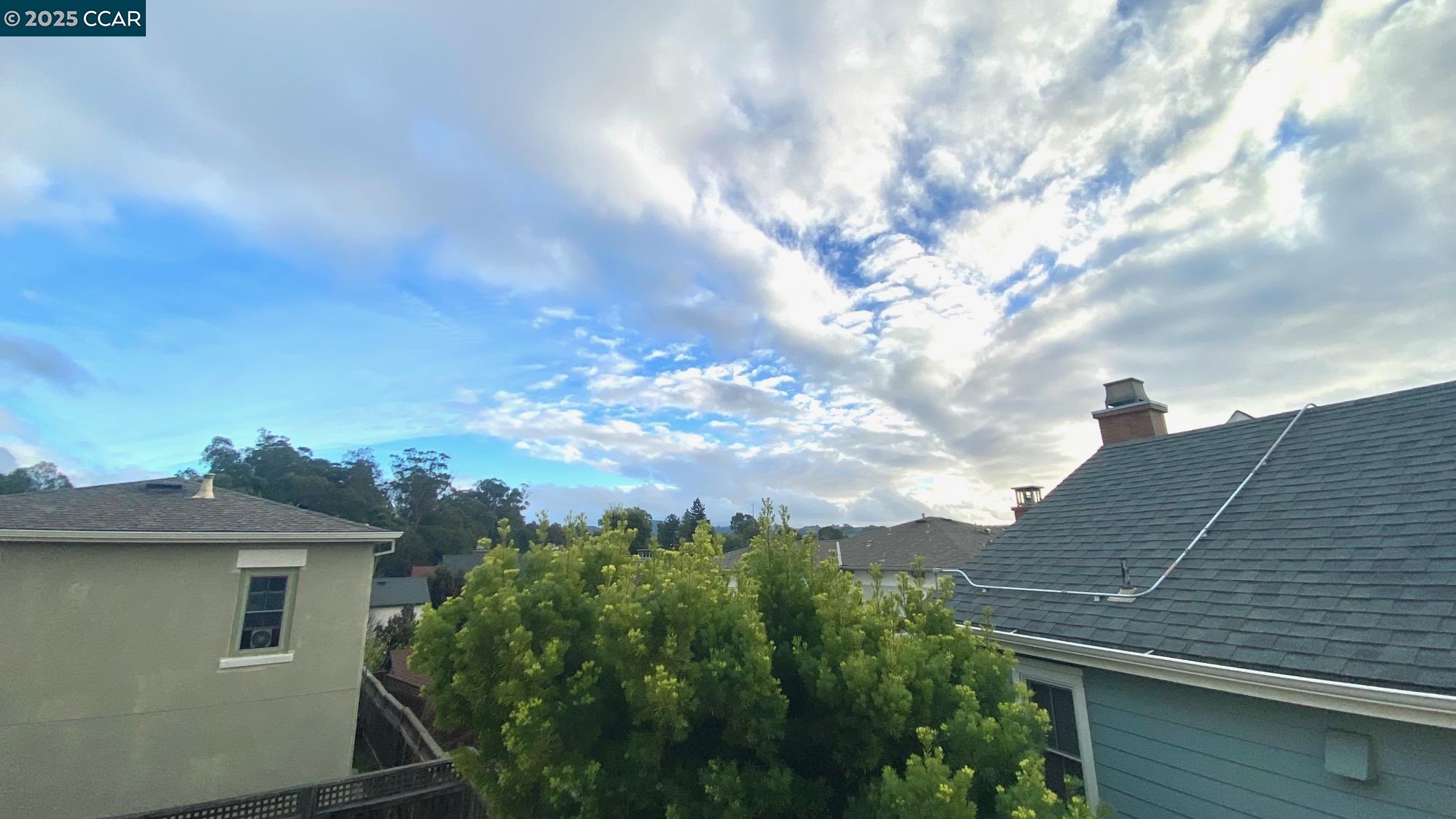 1027 Main Street, Unit B Hercules, CA 94547 - Photo 33 of 39 a view of a house with a yard