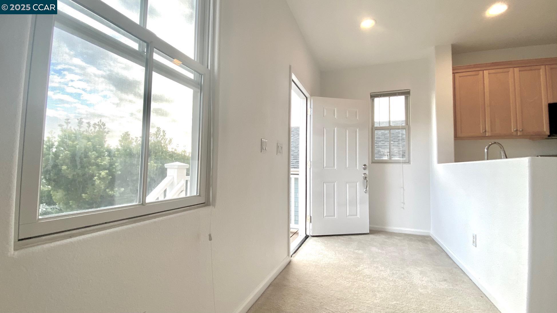 1027 Main Street, Unit B Hercules, CA 94547 - Photo 7 of 39 a view of an empty room with a window
