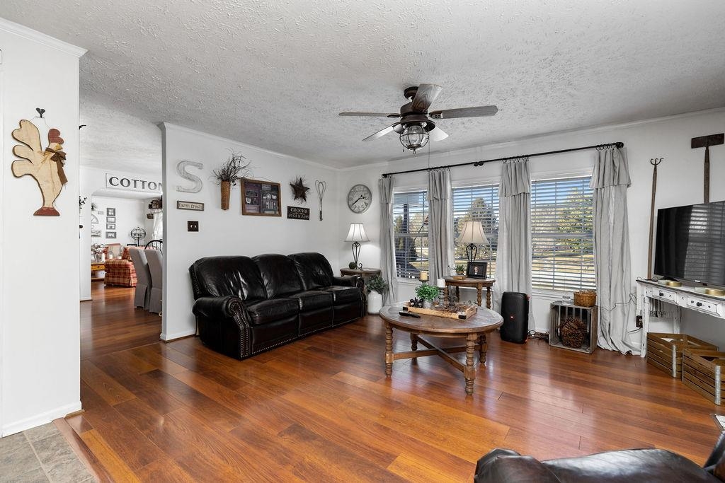 264 Steeles Fort Road Raphine, VA 24472 - Photo 16 of 50 a living room with furniture flat screen tv and a large window