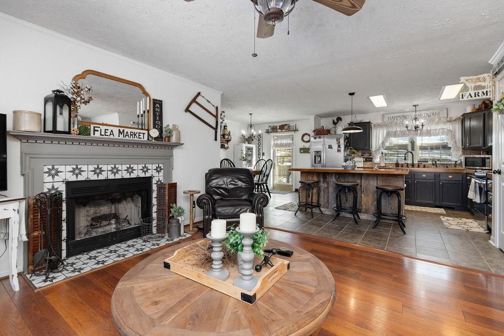 264 Steeles Fort Road Raphine, VA 24472 - Photo 17 of 50 a living room with furniture and a fireplace