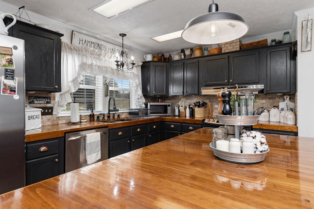 264 Steeles Fort Road Raphine, VA 24472 - Photo 22 of 50 a kitchen with a table and chairs in it