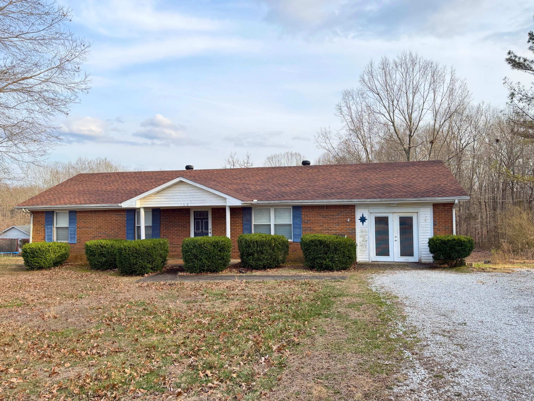 160 Allen Road Drakesboro, KY 42337 - Photo 2 of 15 a front view of a house with a yard