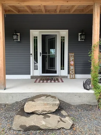 a view of swimming pool of a house with a yard