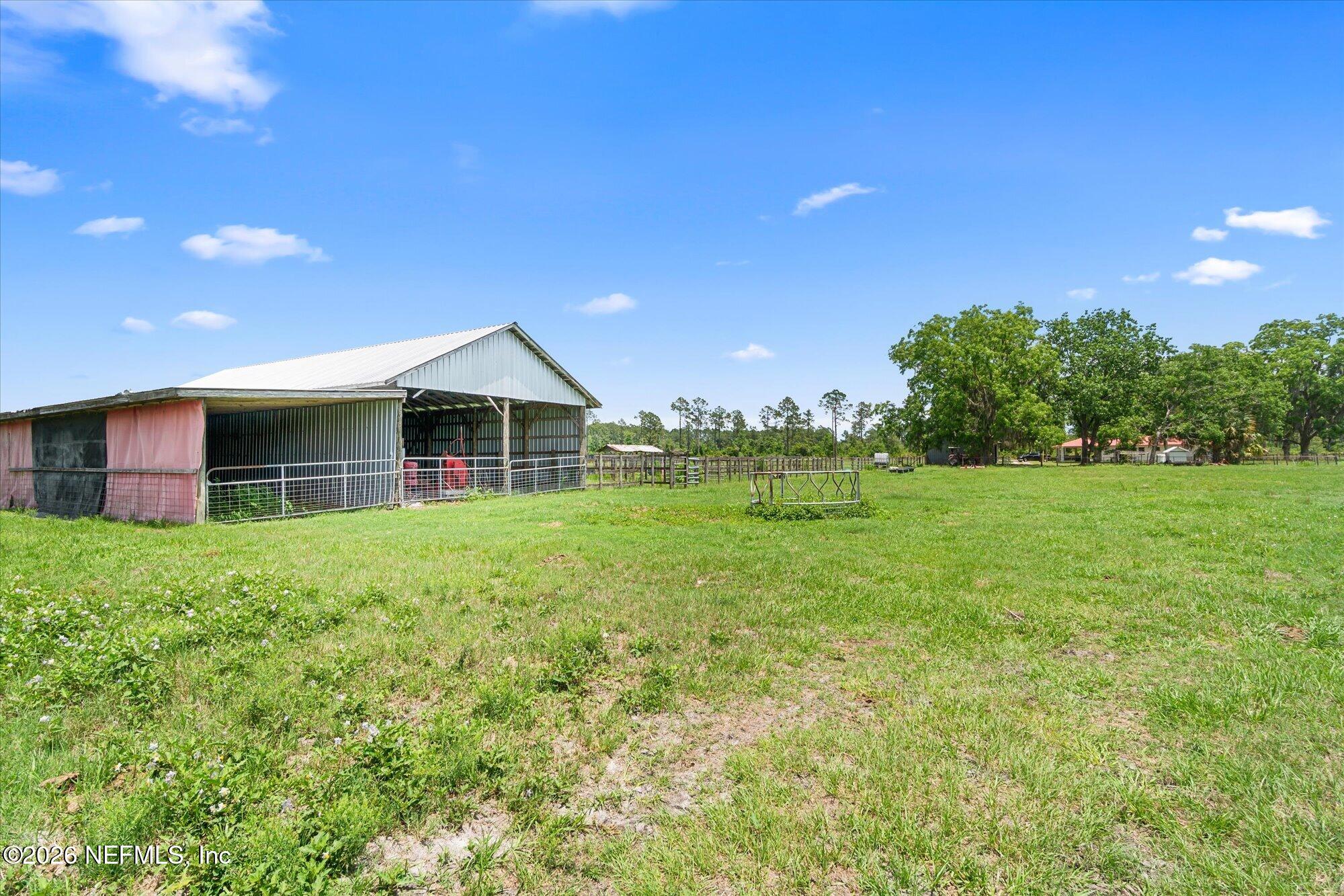 786 West River Road Palatka, FL 32177 - Photo 7 of 53 a view of a house with backyard and garden