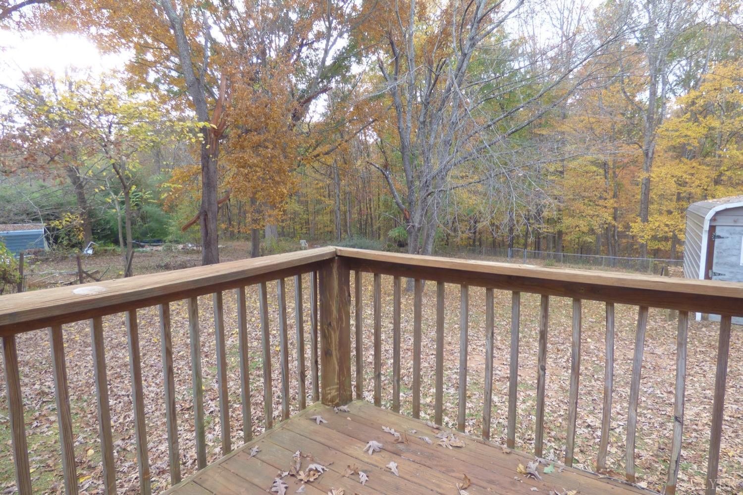 1381 Boxwood Farm Road Amherst, VA 24521 - Photo 2 of 20 a view of a wooden fence and trees