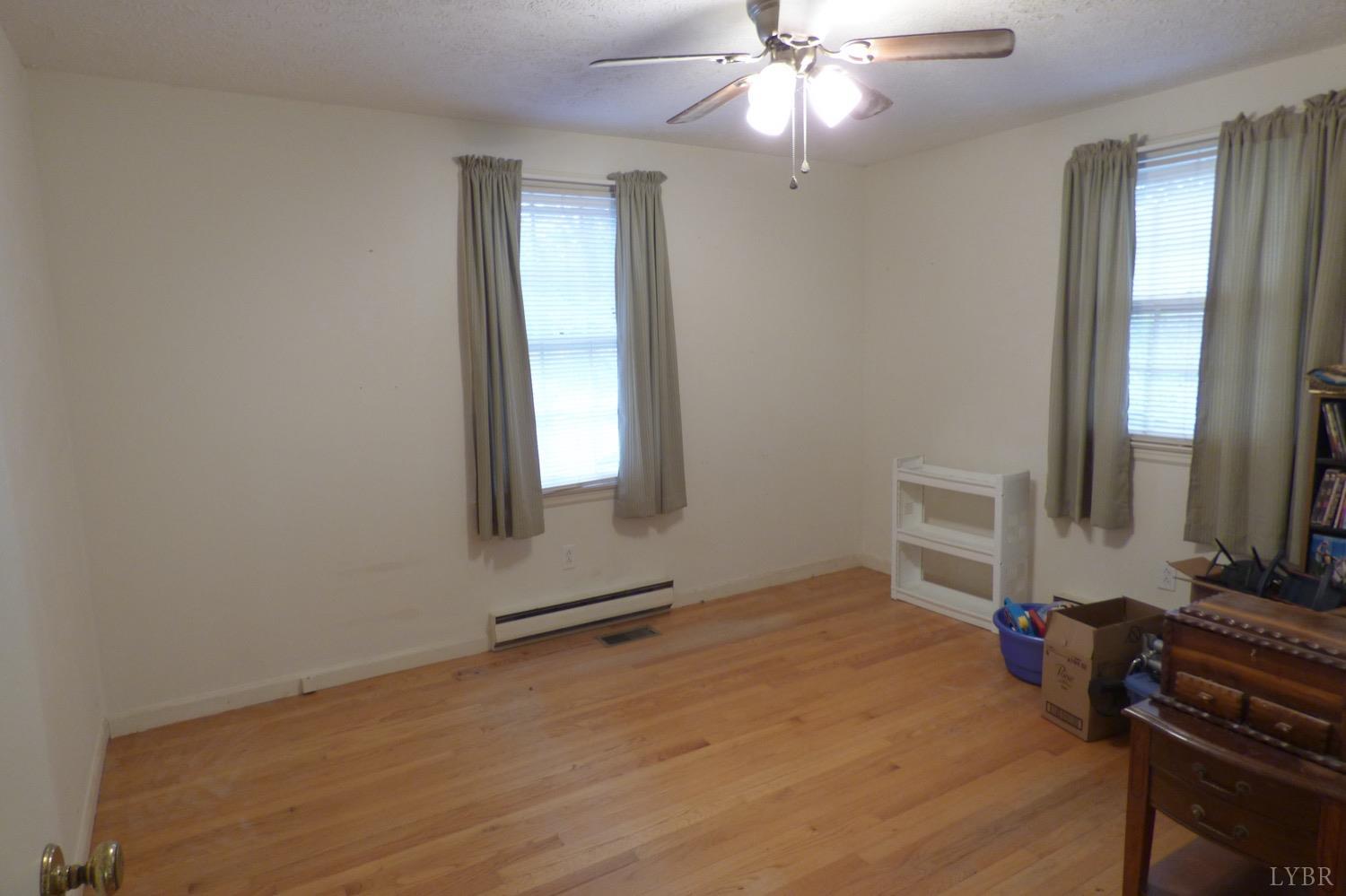 1381 Boxwood Farm Road Amherst, VA 24521 - Photo 5 of 20 wooden floor and window in a room
