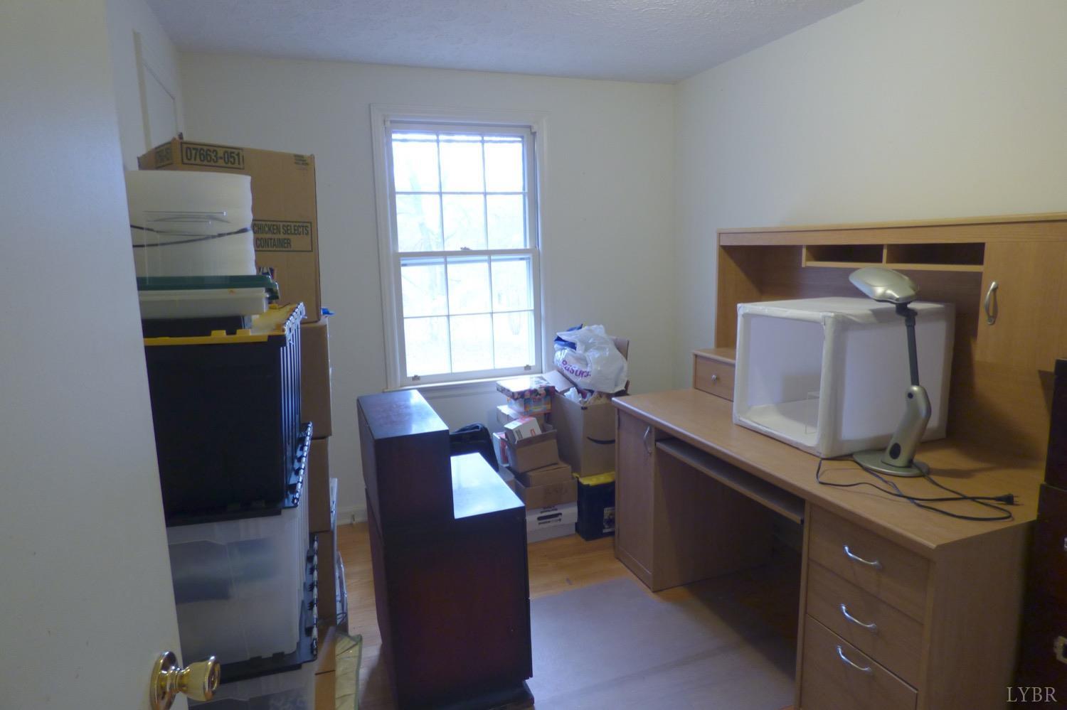 1381 Boxwood Farm Road Amherst, VA 24521 - Photo 6 of 20 a room with storage and utility