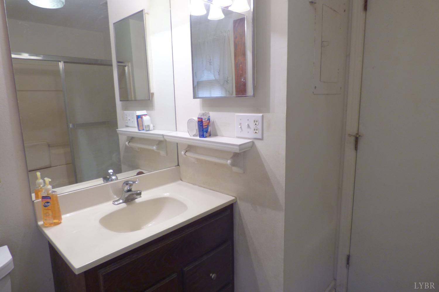 1381 Boxwood Farm Road Amherst, VA 24521 - Photo 8 of 20 a bathroom with a sink and a mirror