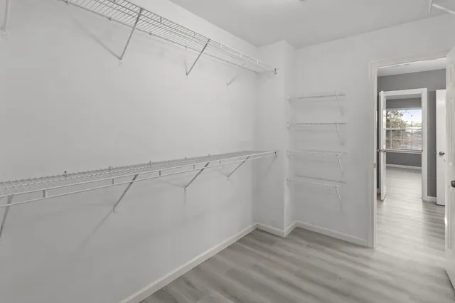 a view of a room with racks on the wall