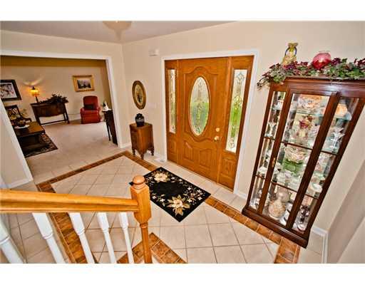 132 Buttercup Road Butler, PA 16001 - Photo 4 of 18 Entry/Foyer. WOOD /FIBERGLASS ENTRY DOOR WITH SIDE TRANSOMS OPENS TO FORMAL LIVINGROOM OR DEN/OFFICE