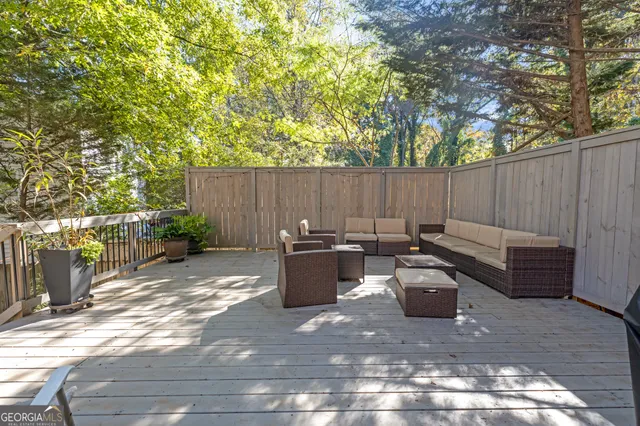 a view of a backyard with furniture