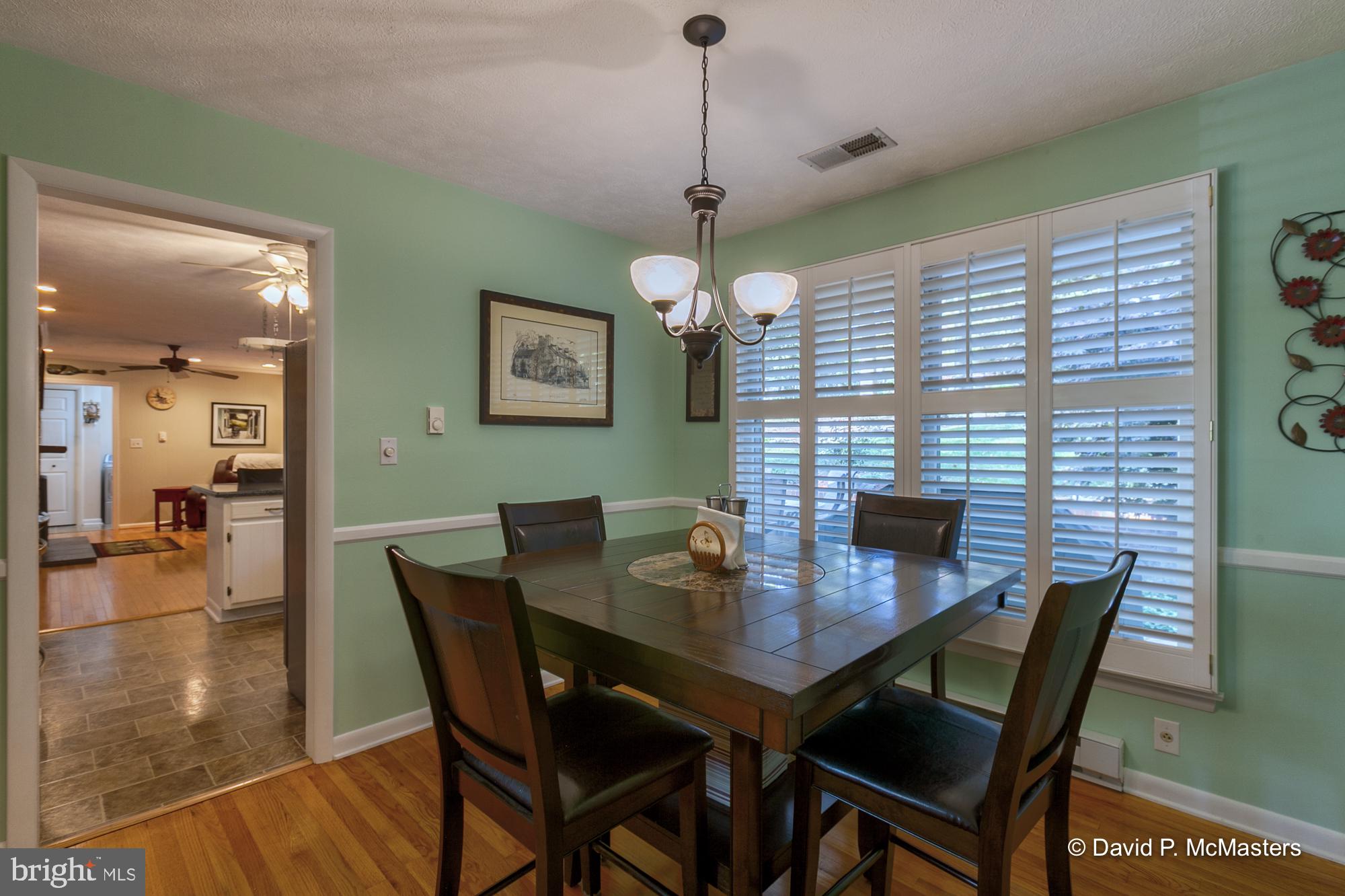 41 Kinlock Road Inwood, WV 25428 - Photo 11 of 44 Dining area into kitchen/ family room.