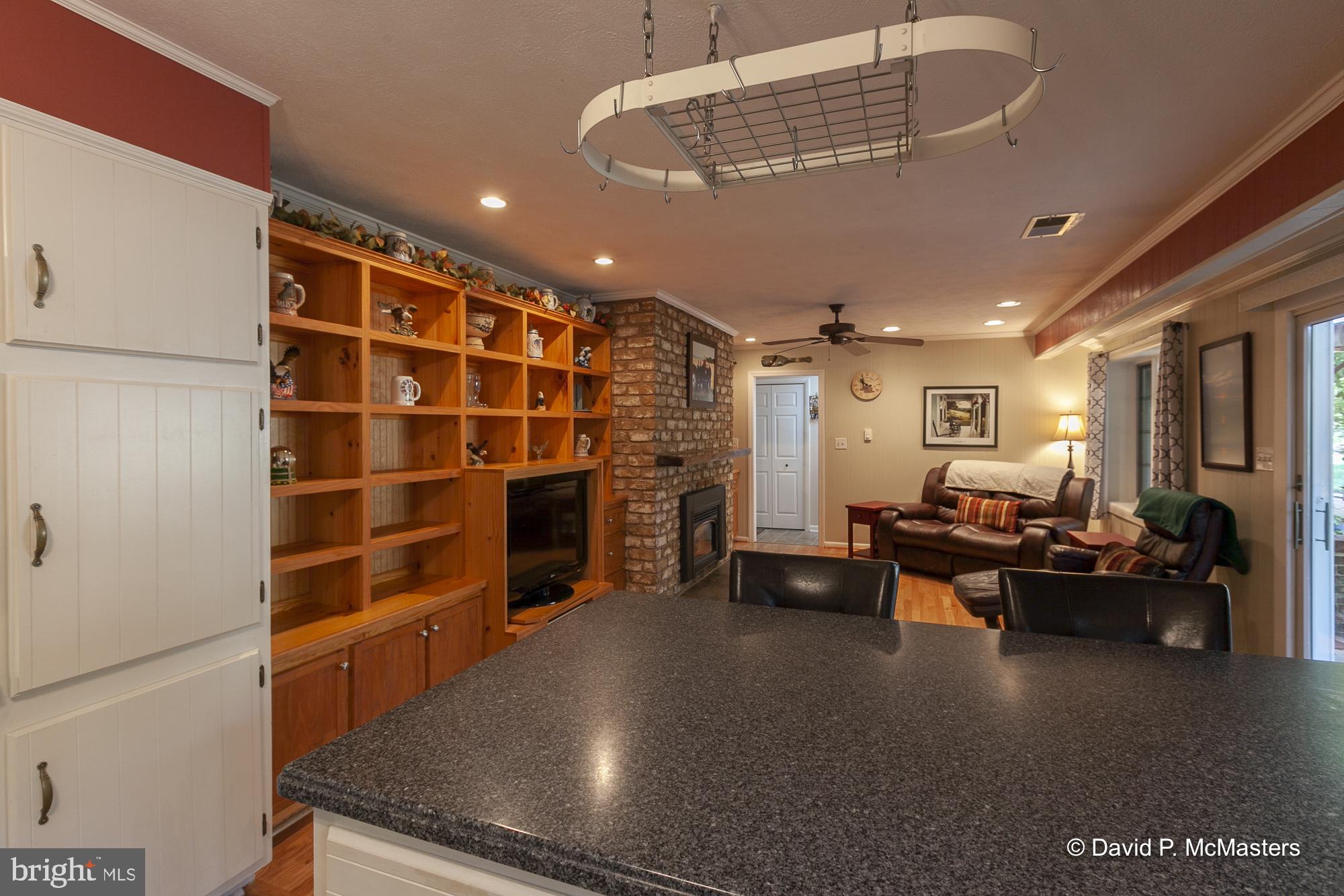 41 Kinlock Road Inwood, WV 25428 - Photo 18 of 44 Peninsula island kitchen into family room.