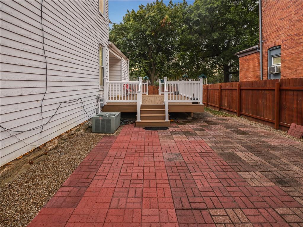 1728 Chislett Street Pittsburgh, PA 15206 - Photo 16 of 16 a front view of a house with a yard