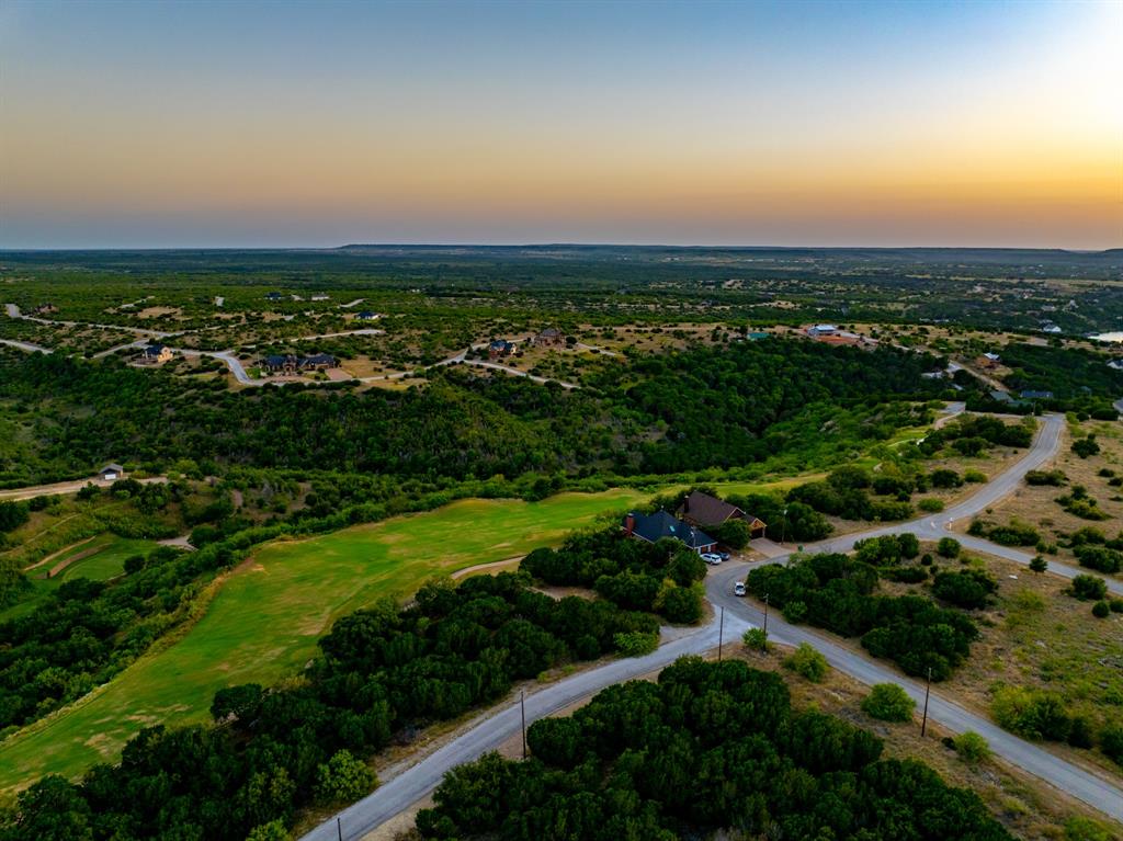 105 Turnberry Loop Graford, TX 76449 - Photo 14 of 34 an aerial view of city and lake view