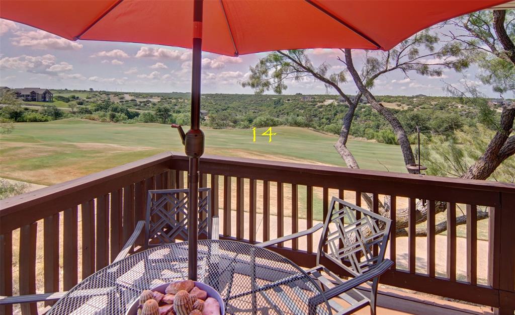 105 Turnberry Loop Graford, TX 76449 - Photo 17 of 34 a view of trees and deck in the patio