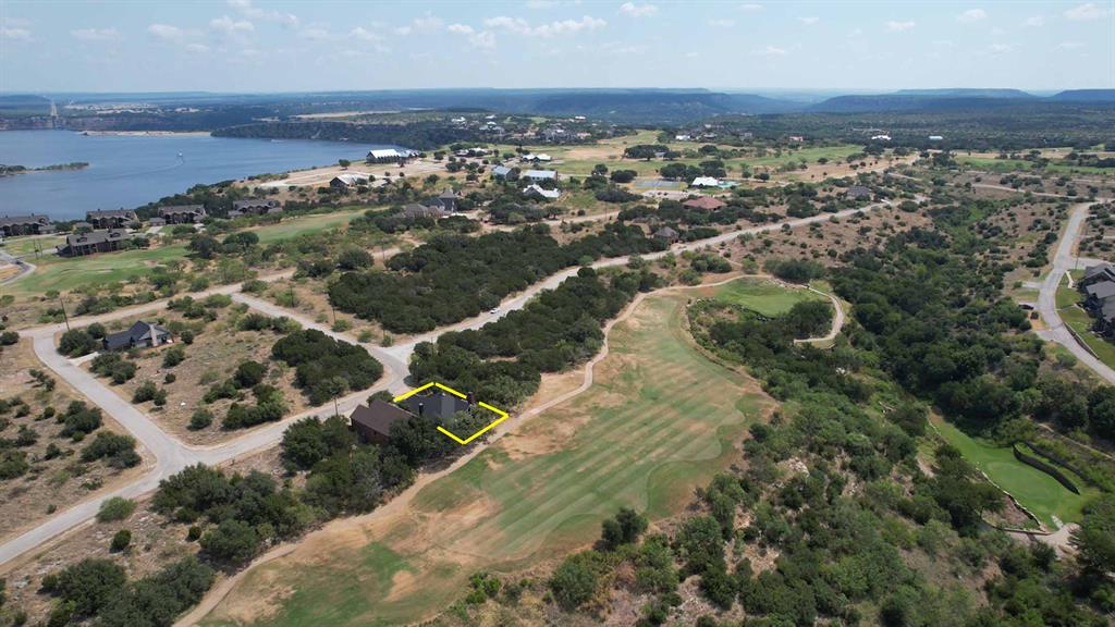 105 Turnberry Loop Graford, TX 76449 - Photo 34 of 34 an aerial view of residential houses with outdoor space