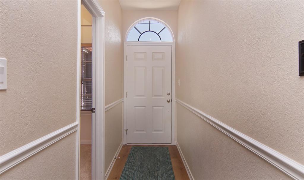 105 Turnberry Loop Graford, TX 76449 - Photo 7 of 34 a view of hallway with wooden floor