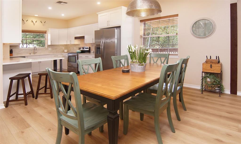105 Turnberry Loop Graford, TX 76449 - Photo 10 of 34 a view of a dining room with furniture and a large window